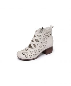 MLD Rumour Has It | Criss-Cross Upper Cut-Out Cream Leather Boots