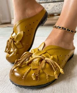 XR Rumour Has It | Flower Tassel Perforated Accent Leather Mules - Yellow