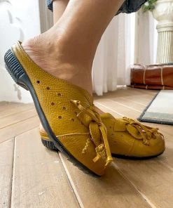 XR Rumour Has It | Flower Tassel Perforated Accent Leather Mules - Yellow